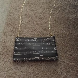 Music note cross body